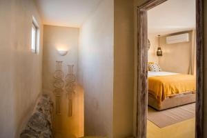 Postel nebo postele na pokoji v ubytování SeaYa Villas