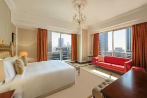 Dusit Hotel & Suites - Doha房間的床