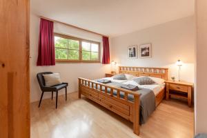 Ein Bett oder Betten in einem Zimmer der Unterkunft Landhaus Bergner Alm