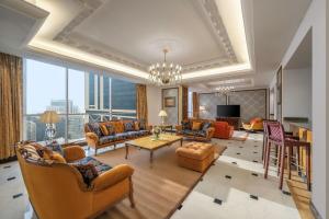 Dusit Hotel & Suites - Doha電視和／或娛樂中心