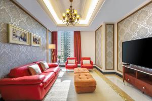 Dusit Hotel & Suites - Doha電視和／或娛樂中心