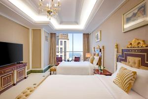 Dusit Hotel & Suites - Doha電視和／或娛樂中心