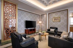 Dusit Hotel & Suites - Doha電視和／或娛樂中心