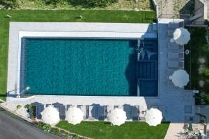 an overhead view of a swimming pool at Borgo Ermanno in Tignale