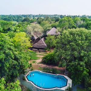an aerial view of a resort with a swimming pool at The Saraii Tree Lodge in Tissamaharama
