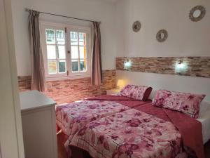 Postel nebo postele na pokoji v ubytování Bungalow Santa Fe en Playa del Inglés