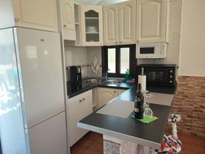 Kuchyň nebo kuchyňský kout v ubytování Bungalow Santa Fe en Playa del Inglés