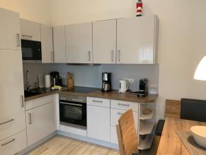 Kuchyň nebo kuchyňský kout v ubytování Loft Froenskip Nordsee Park Dangast