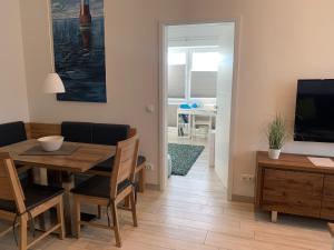 TV a/nebo společenská místnost v ubytování Loft Froenskip Nordsee Park Dangast