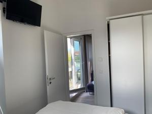 Postel nebo postele na pokoji v ubytování Loft Froenskip Nordsee Park Dangast
