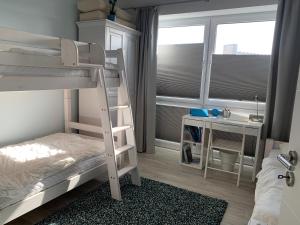 Postel nebo postele na pokoji v ubytování Loft Froenskip Nordsee Park Dangast