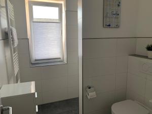 Koupelna v ubytování Loft Froenskip Nordsee Park Dangast