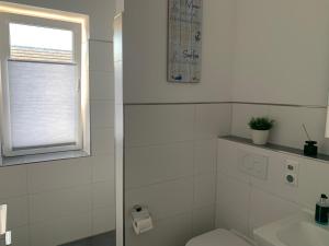 Koupelna v ubytování Loft Froenskip Nordsee Park Dangast