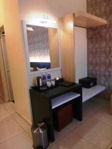 Kuchyň nebo kuchyňský kout v ubytování Supreme Hotel