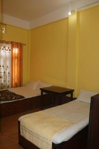 Postel nebo postele na pokoji v ubytování Hotel Quality