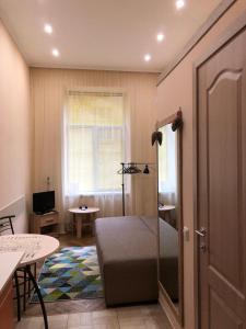 Televízia a/alebo spoločenská miestnosť v ubytovaní Apartament at Park