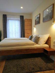 Voodi või voodid majutusasutuse Gästehaus Moser toas