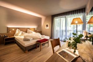 A bed or beds in a room at Bad Ratzes