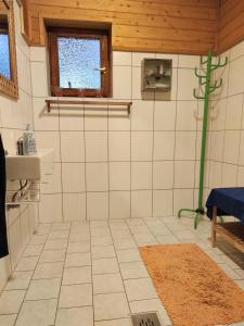 Vannituba majutusasutuses Gästehaus Moser
