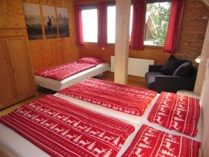 Postel nebo postele na pokoji v ubytování Zirbenwald Lodge