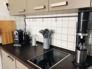 Virtuve vai virtuves zona naktsmītnē Appartement -einfachschön-