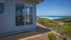 a beach house with a view of the ocean at Moggs View in Aireys Inlet