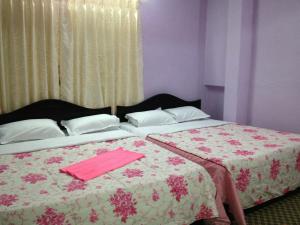 Letto o letti in una camera di Pashupati Darshan Hotel