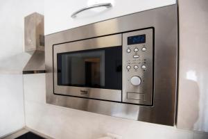 A kitchen or kitchenette at Appartamento Carducci Fiera Rho Milan