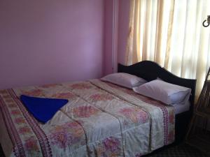 Letto o letti in una camera di Pashupati Darshan Hotel