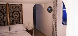 Voodi või voodid majutusasutuse Riad Soul of Tetouan toas