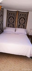 Voodi või voodid majutusasutuse Riad Soul of Tetouan toas