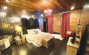 Postel nebo postele na pokoji v ubytování Mulberry Inn