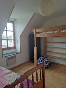 Posteľ alebo postele v izbe v ubytovaní Gîte de la Forêt + 2 fotografie