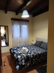 Ένα ή περισσότερα κρεβάτια σε δωμάτιο στο Villa Quijada