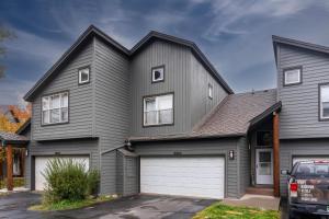 a gray house with a white garage at Aspen Getaway in Edwards