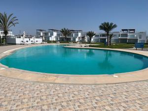 Bazén v ubytování 1 Fila Vista Bahía Paracas - La Velas 501 T1 nebo v jeho okolí