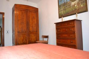 En eller flere senge i et værelse på Casa MARIO