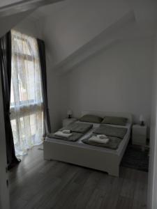 Posteľ alebo postele v izbe v ubytovaní Apartmani Dubrava 3 + 4 fotografie