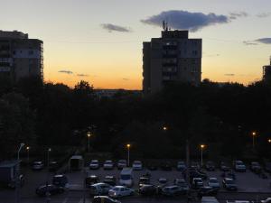 a parking lot full of cars at sunset at PO LARI AMP in Ploieşti