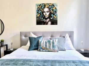 Posteľ alebo postele v izbe v ubytovaní BELLE ART Design Suite im Herzen von Wien