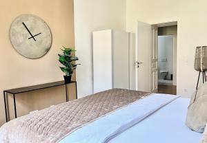 Posteľ alebo postele v izbe v ubytovaní BELLE ART Design Suite im Herzen von Wien
