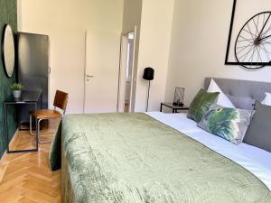 Posteľ alebo postele v izbe v ubytovaní BELLE ART Design Suite im Herzen von Wien