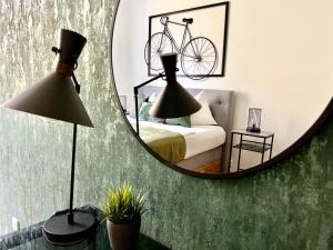 Posteľ alebo postele v izbe v ubytovaní BELLE ART Design Suite im Herzen von Wien