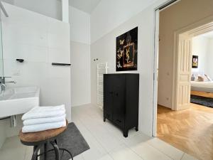 Posteľ alebo postele v izbe v ubytovaní BELLE ART Design Suite im Herzen von Wien