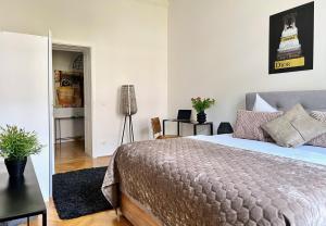 Posteľ alebo postele v izbe v ubytovaní BELLE ART Design Suite im Herzen von Wien