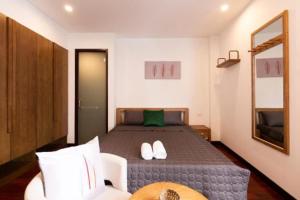 Postel nebo postele na pokoji v ubytování Bao Hoang Dalat