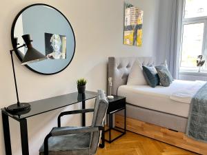 Posteľ alebo postele v izbe v ubytovaní BELLE ART Design Suite im Herzen von Wien