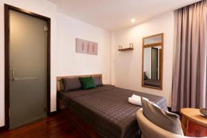 Postel nebo postele na pokoji v ubytování Bao Hoang Dalat