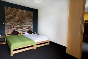 Postel nebo postele na pokoji v ubytování Wohlfühl-Appartment Bielefeld-City + WLAN
