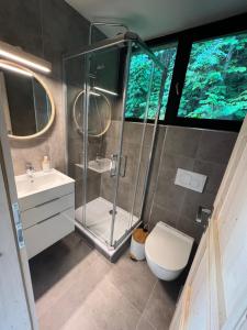 Kopalnica v nastanitvi Apartmány NONE